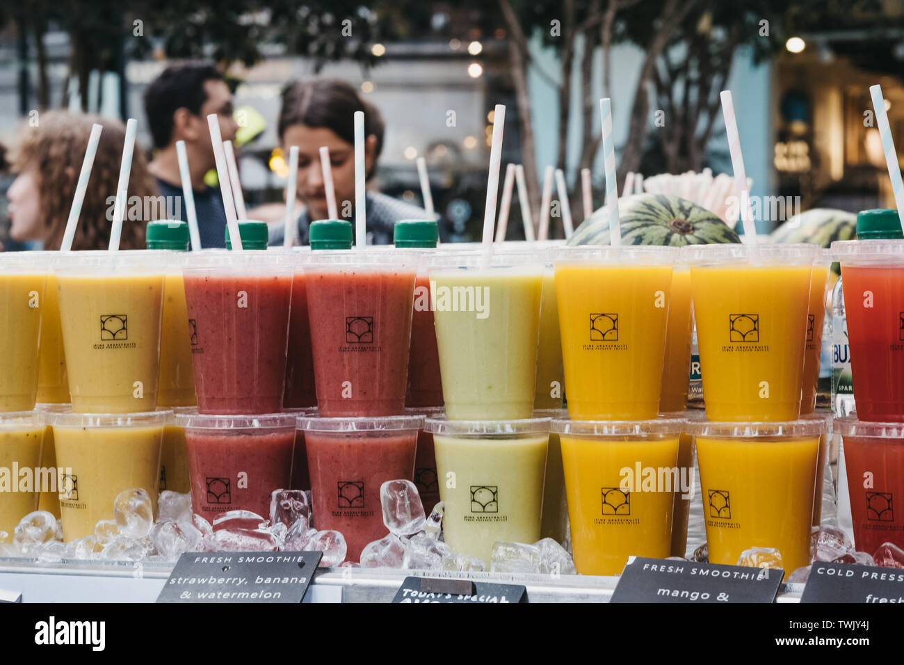 https://c8.alamy.com/comp/TWJY4J/london-uk-june-15-2019-fresh-cold-pressed-juice-on-sale-at-spitalfields-market-one-of-the-finest-surviving-victorian-market-halls-in-london-with-TWJY4J.jpg