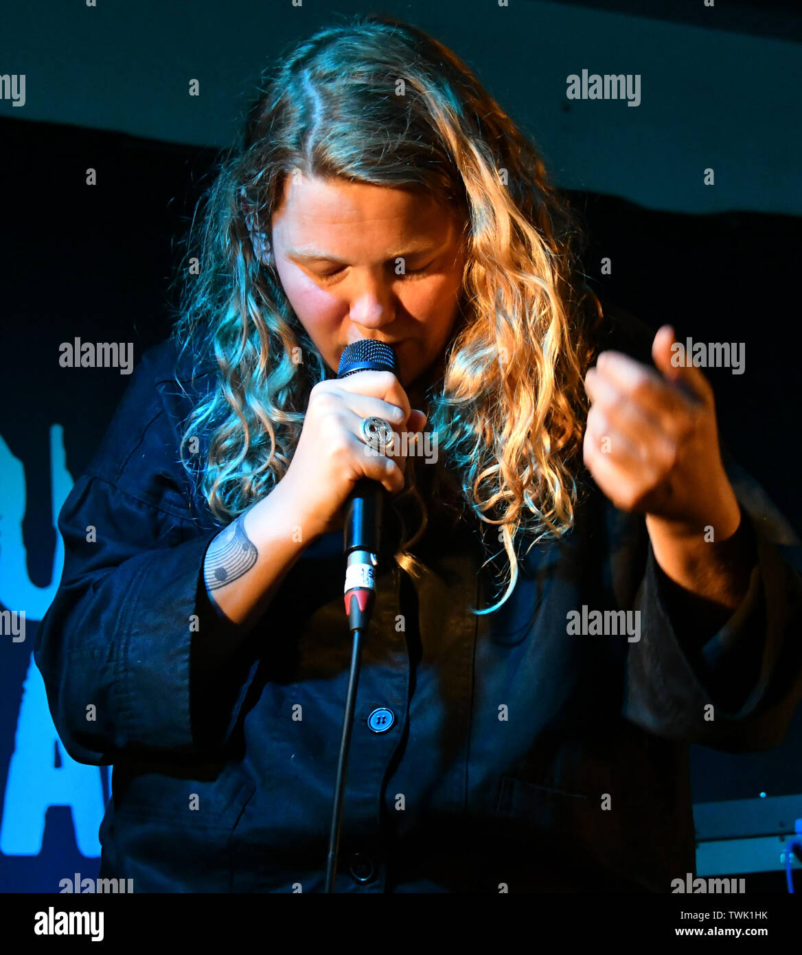 London, UK. 20th June, 2019. Kate Tempest, Mercury Prize-nominated British performance poet and musician performs live in store before signing copies of her new album The Book of Traps and Lessons, at Rough Trade East  London, UK - 20 June 2019 Credit: Nils Jorgensen/Alamy Live News Stock Photo