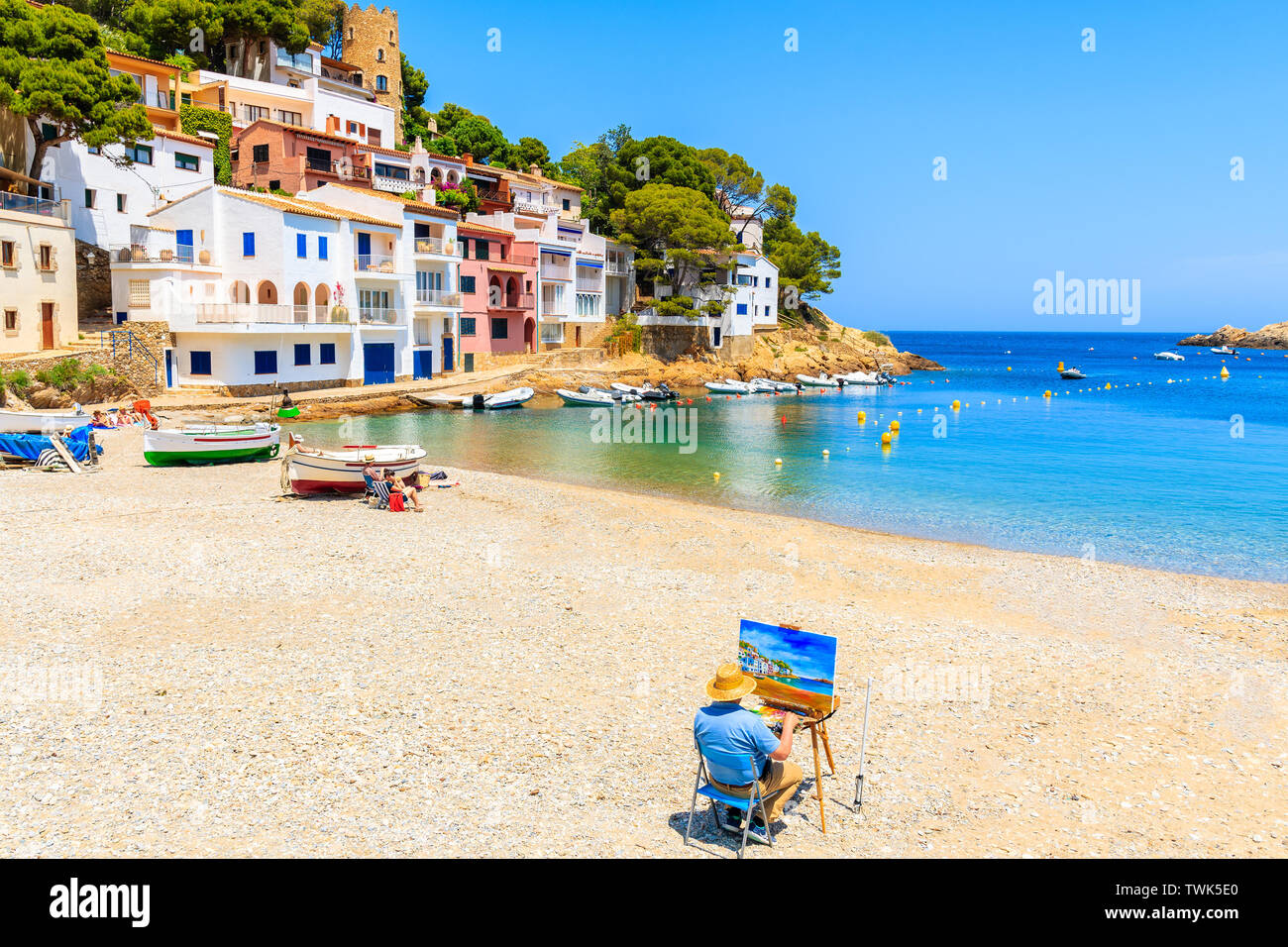 SA TUNA VILLAGE, SPAIN JUN 7, 2019 Man painting picture of beach
