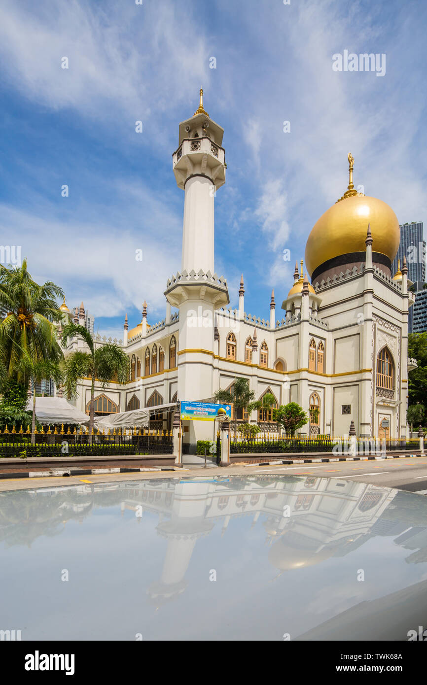 Reflection of Masjid Sultan Mosque along North Bridge road in Kampong Glam, a popular destination for tourists in Singapore. Stock Photo