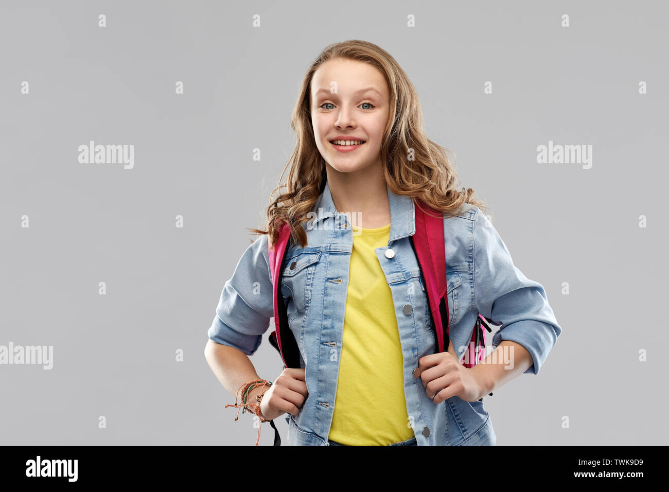 happy smiling teenage student girl with school bag Stock Photo - Alamy