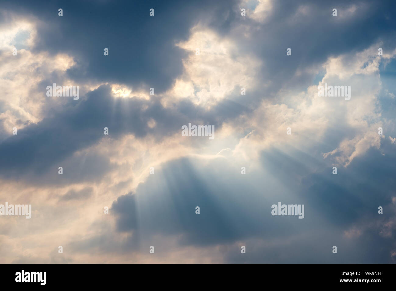 Cloudy in blue sky with sunlight streamer shine Stock Photo - Alamy