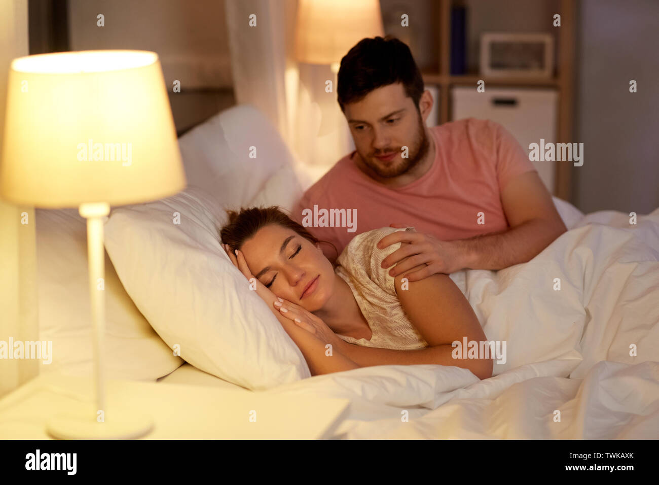 Man waking up woman hires stock photography and images Alamy