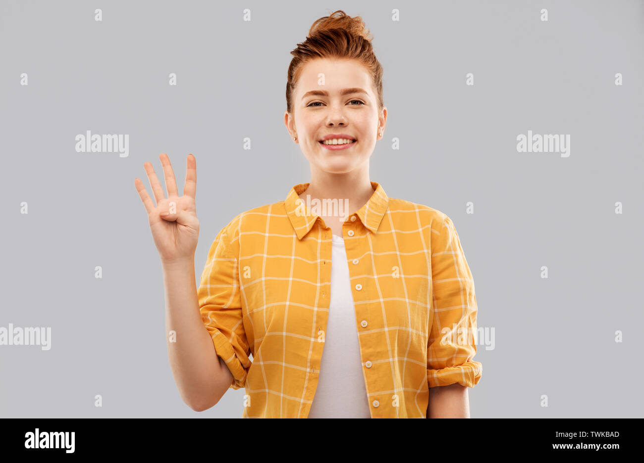 Girl showing four fingers hi-res stock photography and images - Alamy