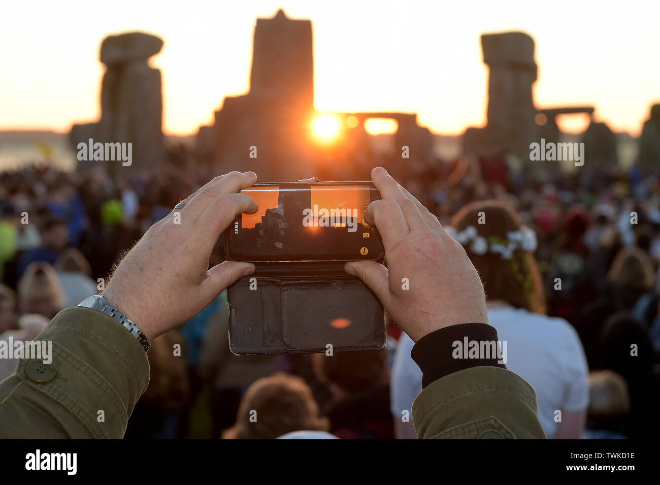 Waiting For The Sun Revellers At Stonehenge In Wiltshire Welcome The 