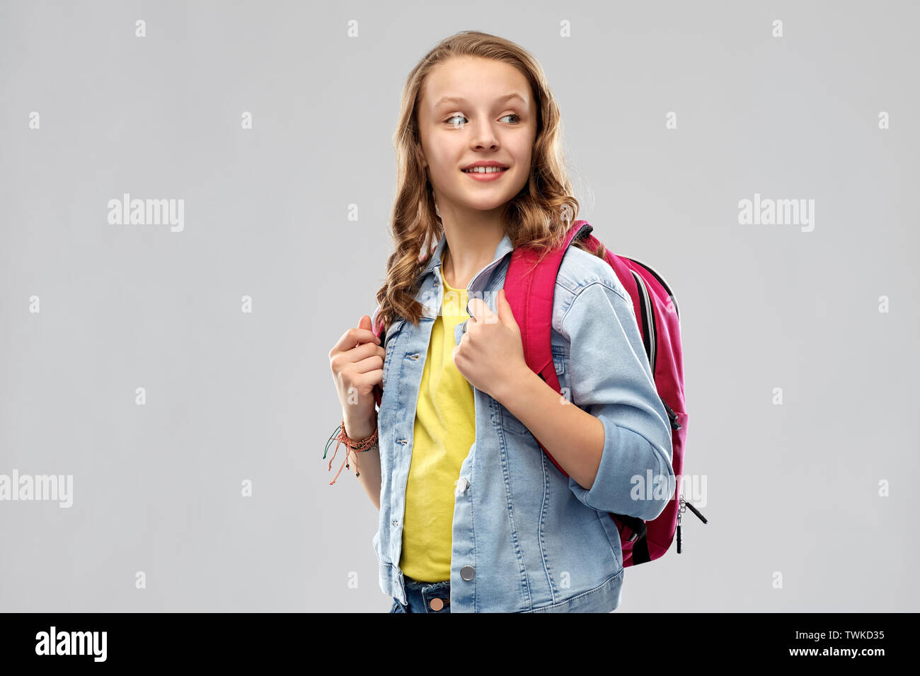 happy smiling teenage student girl with school bag Stock Photo - Alamy