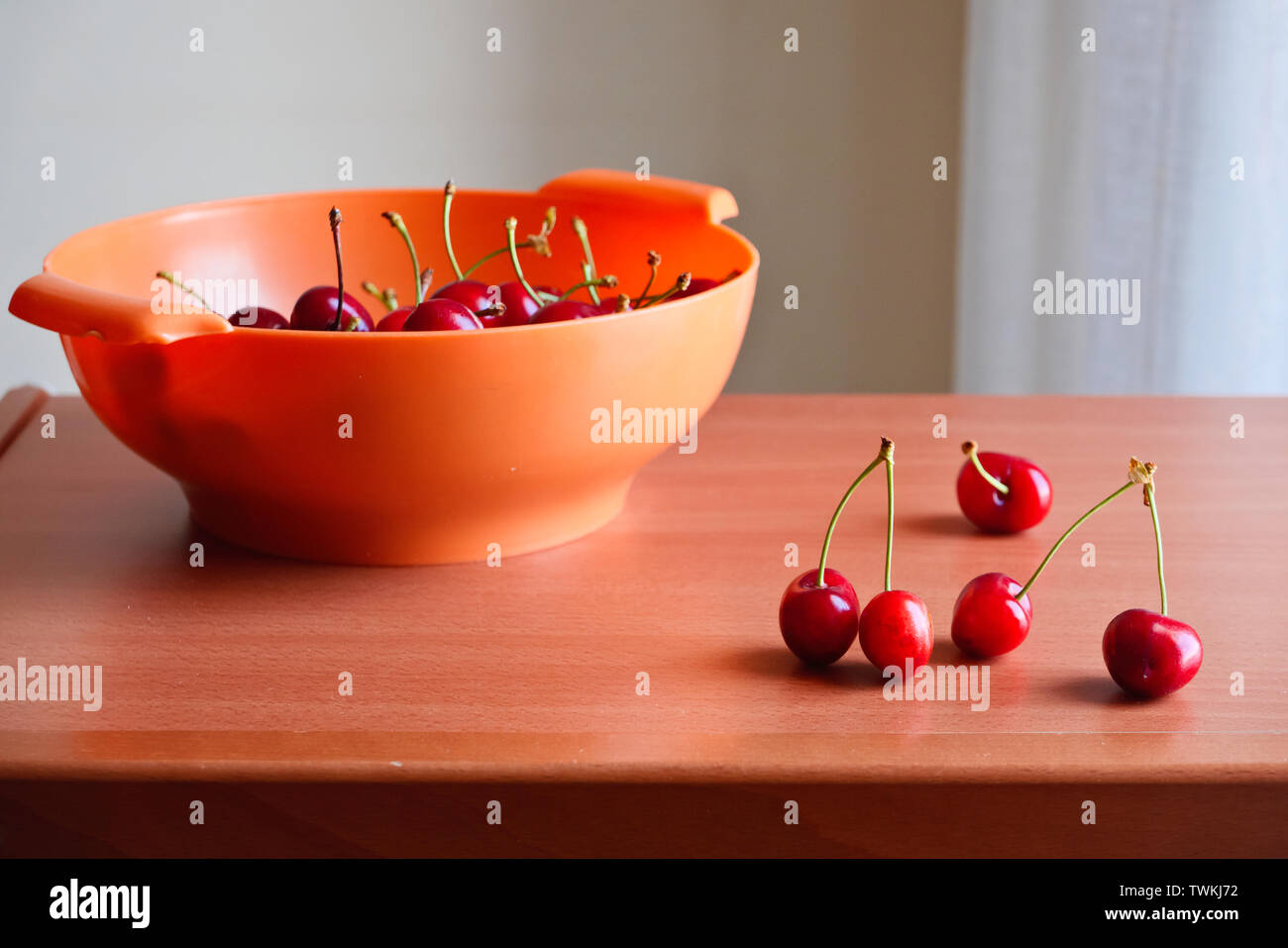 Cherries on the wooden table Stock Photo