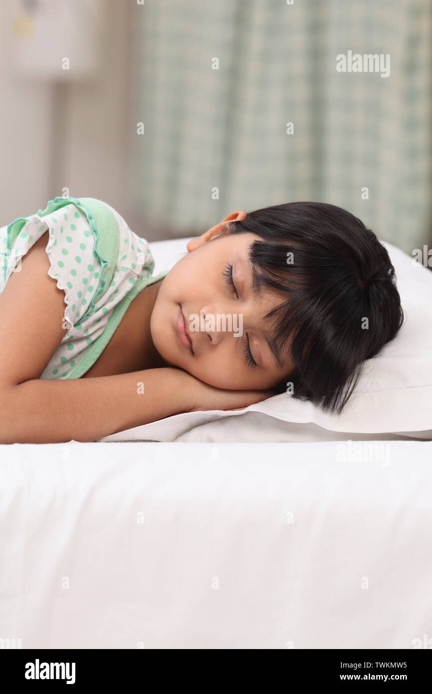 Indian girl sleeping bed hi-res stock photography and images - Alamy
