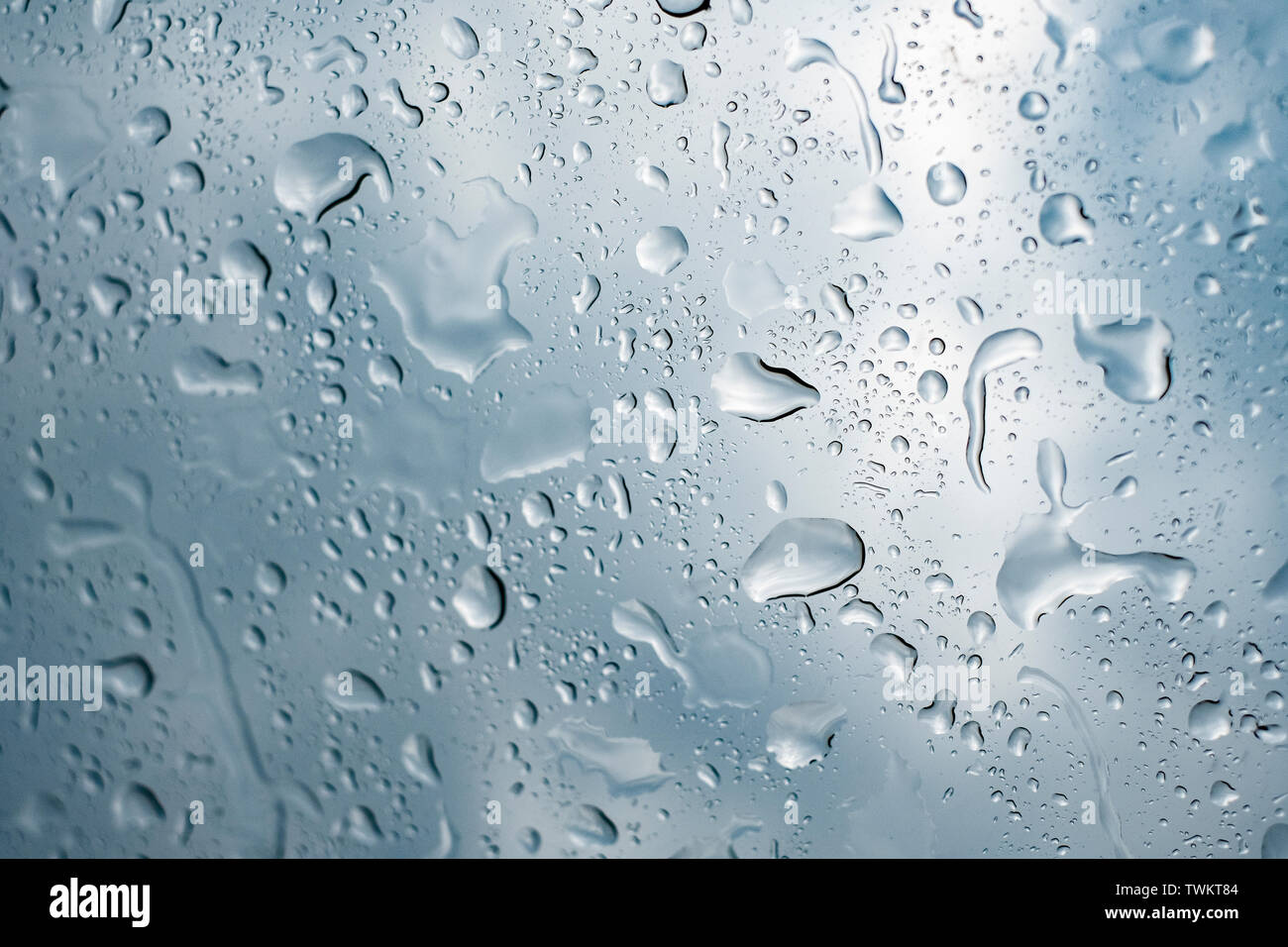 Picture Inside water rain drops on car window glass Stock Photo - Alamy