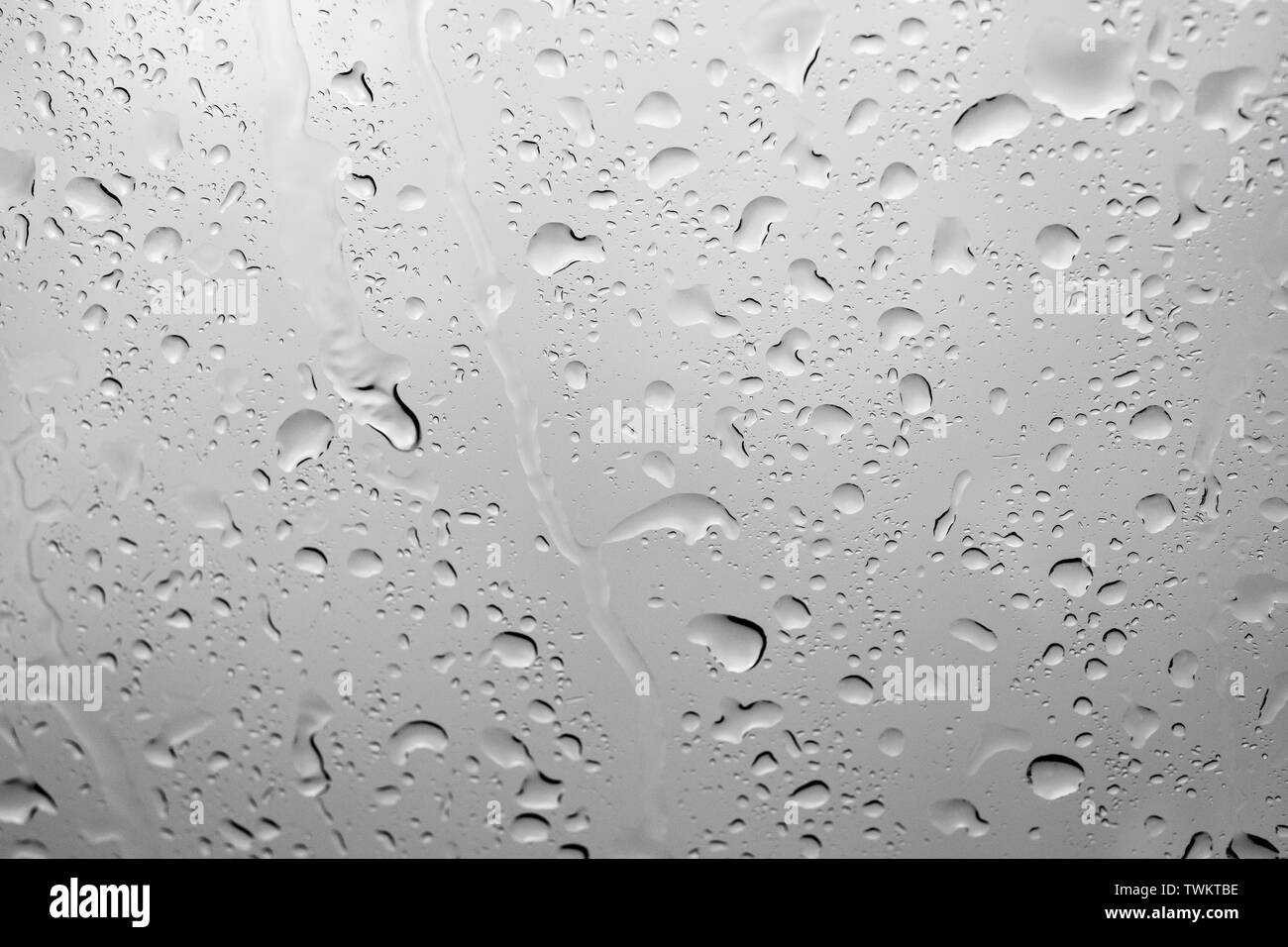 Picture Inside water rain drops on car window glass Stock Photo - Alamy