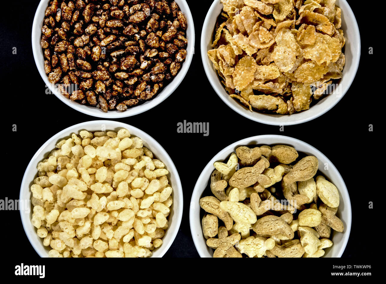 Selection of Healthy Breakfast Cereals In White Bowls With No People