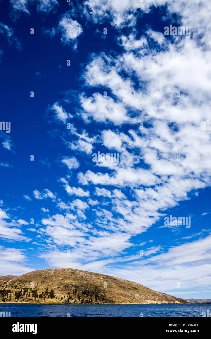 Dramatic cloud formations in the sky over Lake Titicaca, Peru, South America Stock Photo