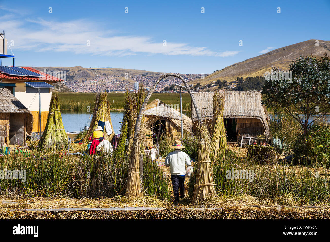 Islanders on Uros islands, reed floating islands on Lake Titicaca, Peru, South America Stock Photo
