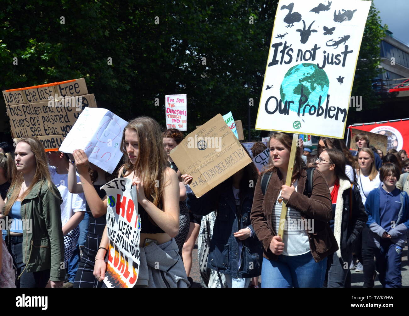 Young people lobby for action to prevent climate change at the  Manchester Youth Strike 4 Climate protest on June 21, 2019, in Manchester, uk. The group marched from St Peter's Square in the city centre to the University of Manchester. One of their demands is for the University to divest itself of investments in fossil fuels. Stock Photo