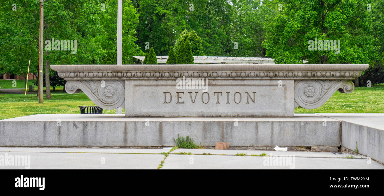 Concrete base of monument commemorating John W Thomas depicting the word Devotion, Centennial Park Nashville Tennessee USA. Stock Photo