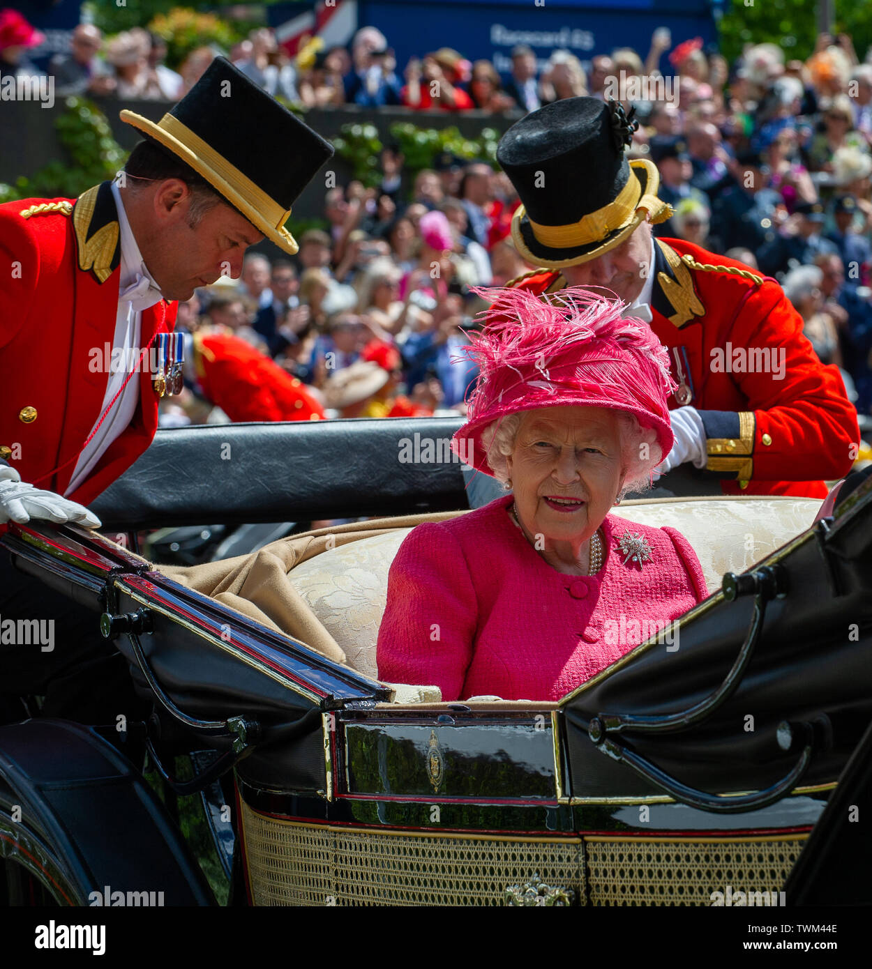 Ascot, Berkshire, UK. 21st June, 2019. Her Majesty the Queen looks radiant in cerise pink as she arrives in the Royal Procession on day four at Royal Ascot, Ascot Racecourse. Credit: Maureen McLean/Alamy Live News Stock Photo