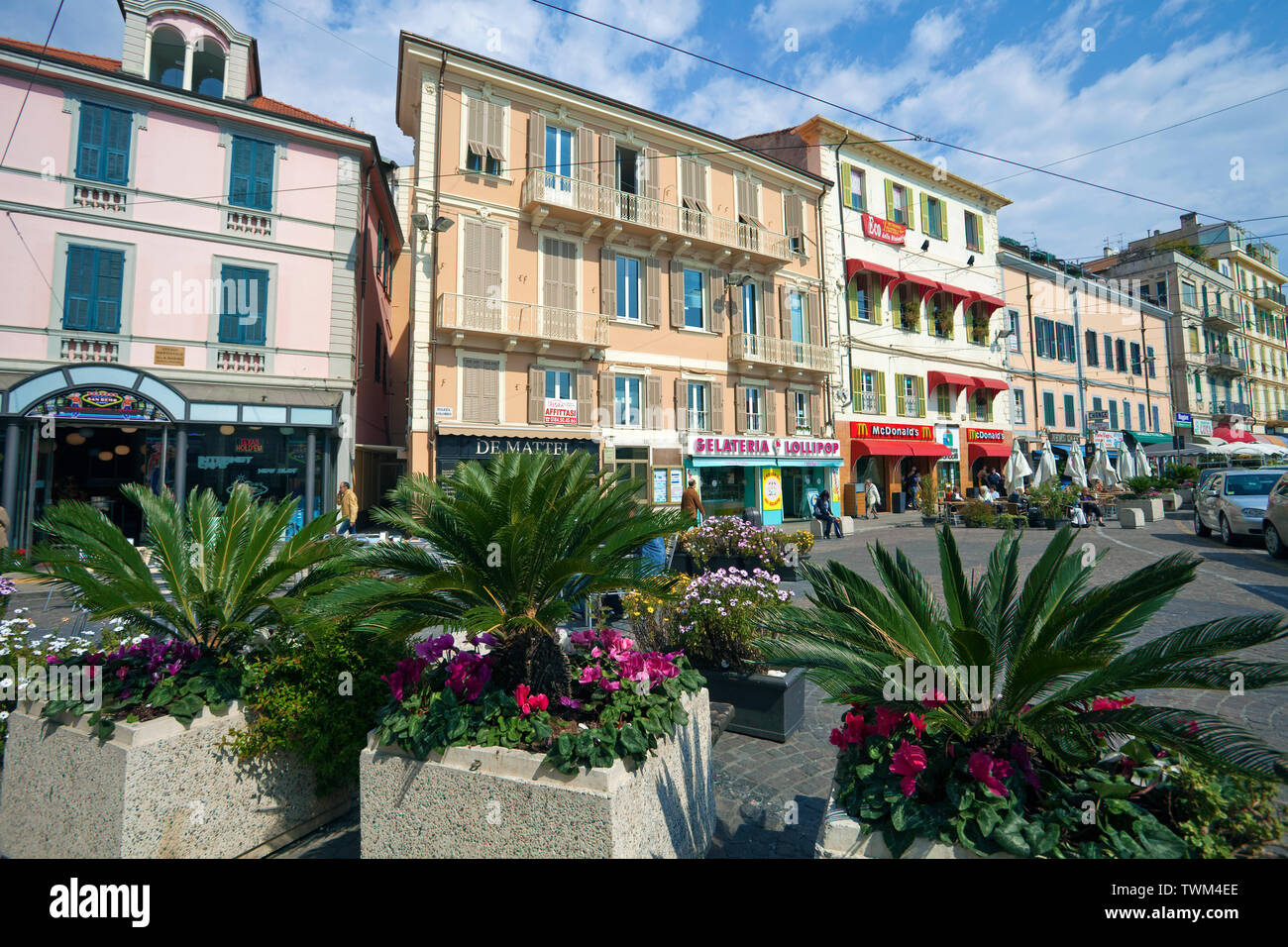 Houses with shops in San Remo, harbour town at the ligurian coast, Liguria, Italy Stock Photo
