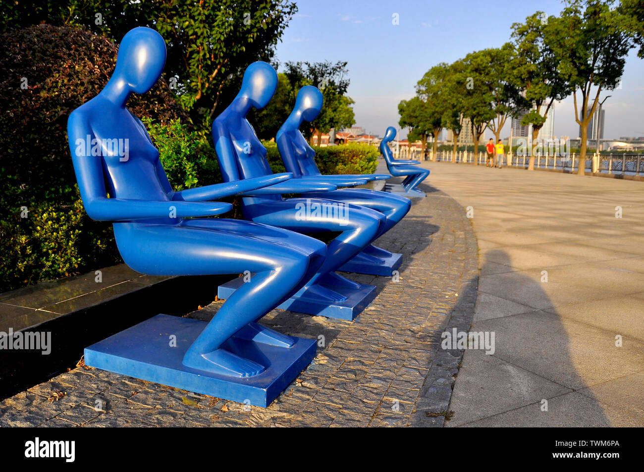 Blue designer park benches by lake Taihu Suzhou China Stock Photo