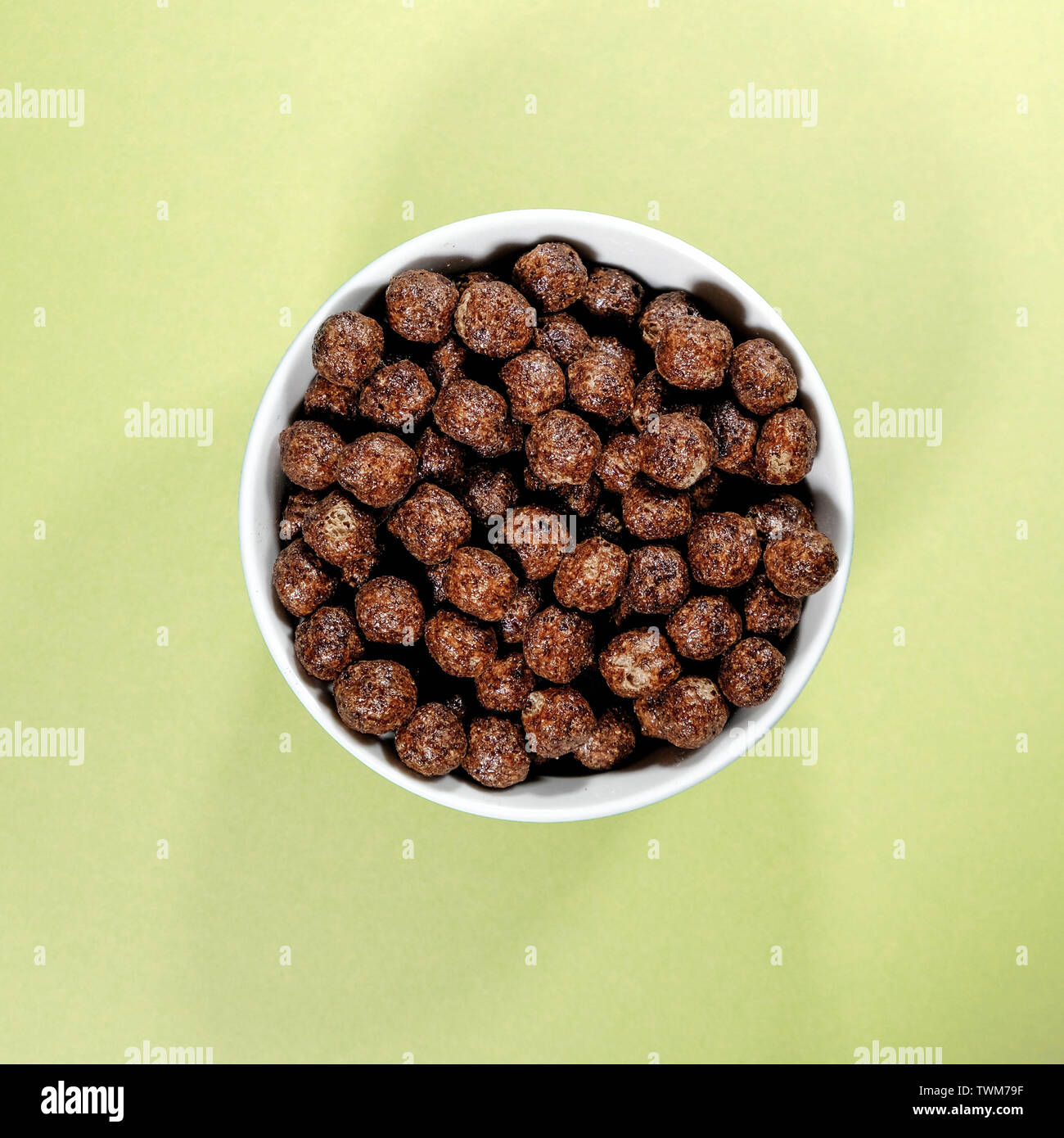Bowl of Nesquik Chocolate FLavoured Breakfast Cereals Isolated High Angle Shot Stock Photo
