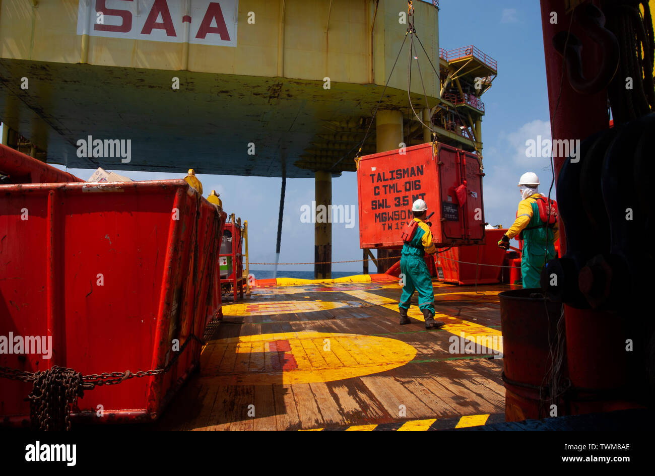 Able seaman rearrange cargo transfer from oil platform Stock Photo