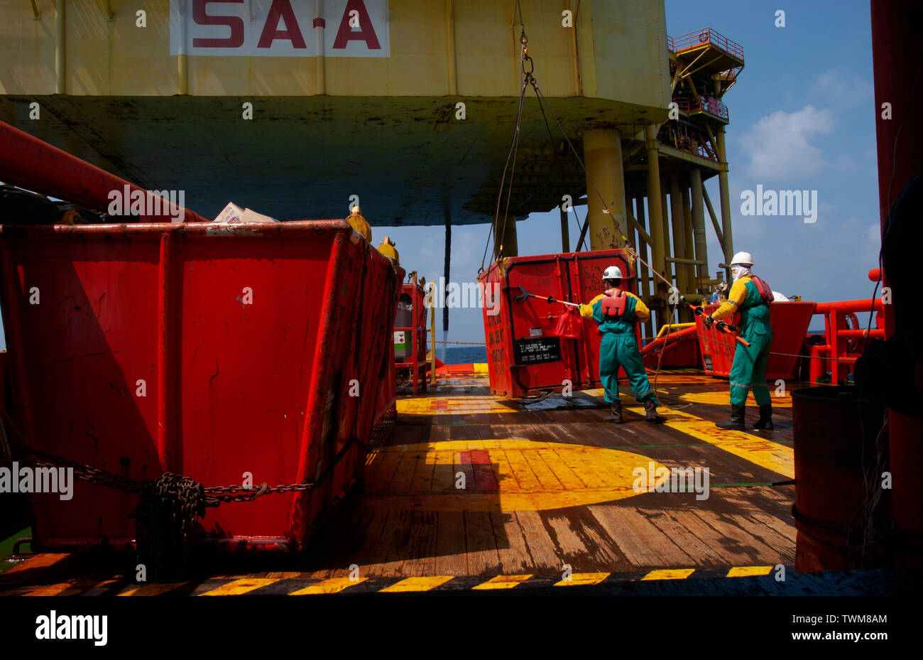 Able seaman rearrange cargo transfer from oil platform Stock Photo