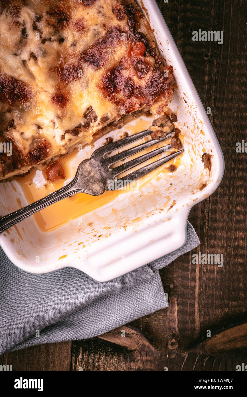 Traditional Italian Bolognese Lasagna on Rustic Wooden Background Stock Photo