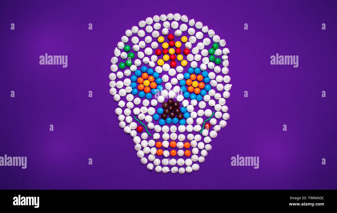 Day of the dead sugar skull made of colorful candies. Stock Photo