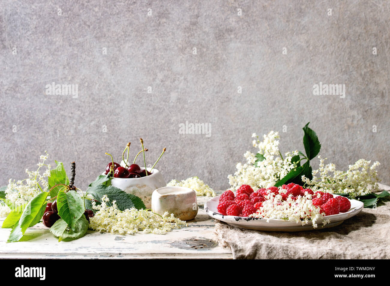 Fresh cherry and raspberry berries Stock Photo - Alamy