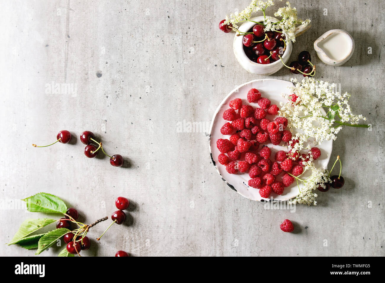 Fresh cherry and raspberry berries Stock Photo - Alamy