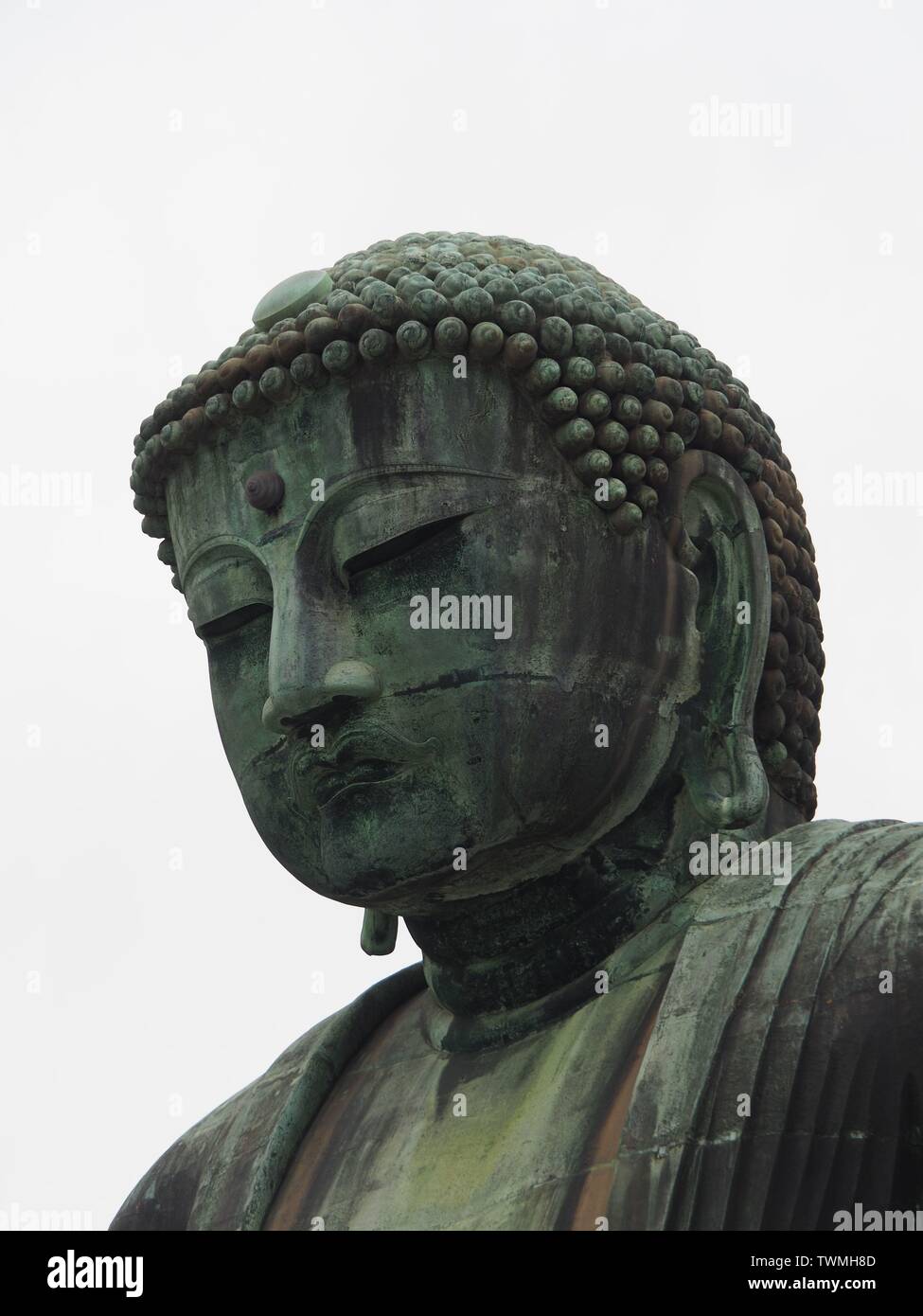 Portrait of the great Buddha of Kamakura in Japan on white background Stock Photo