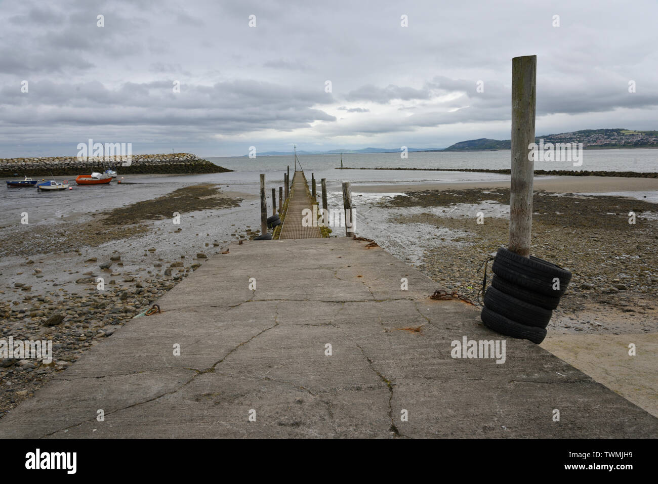 Rhos-on-Sea in very mixed weather rain mist andcloud. Stock Photo
