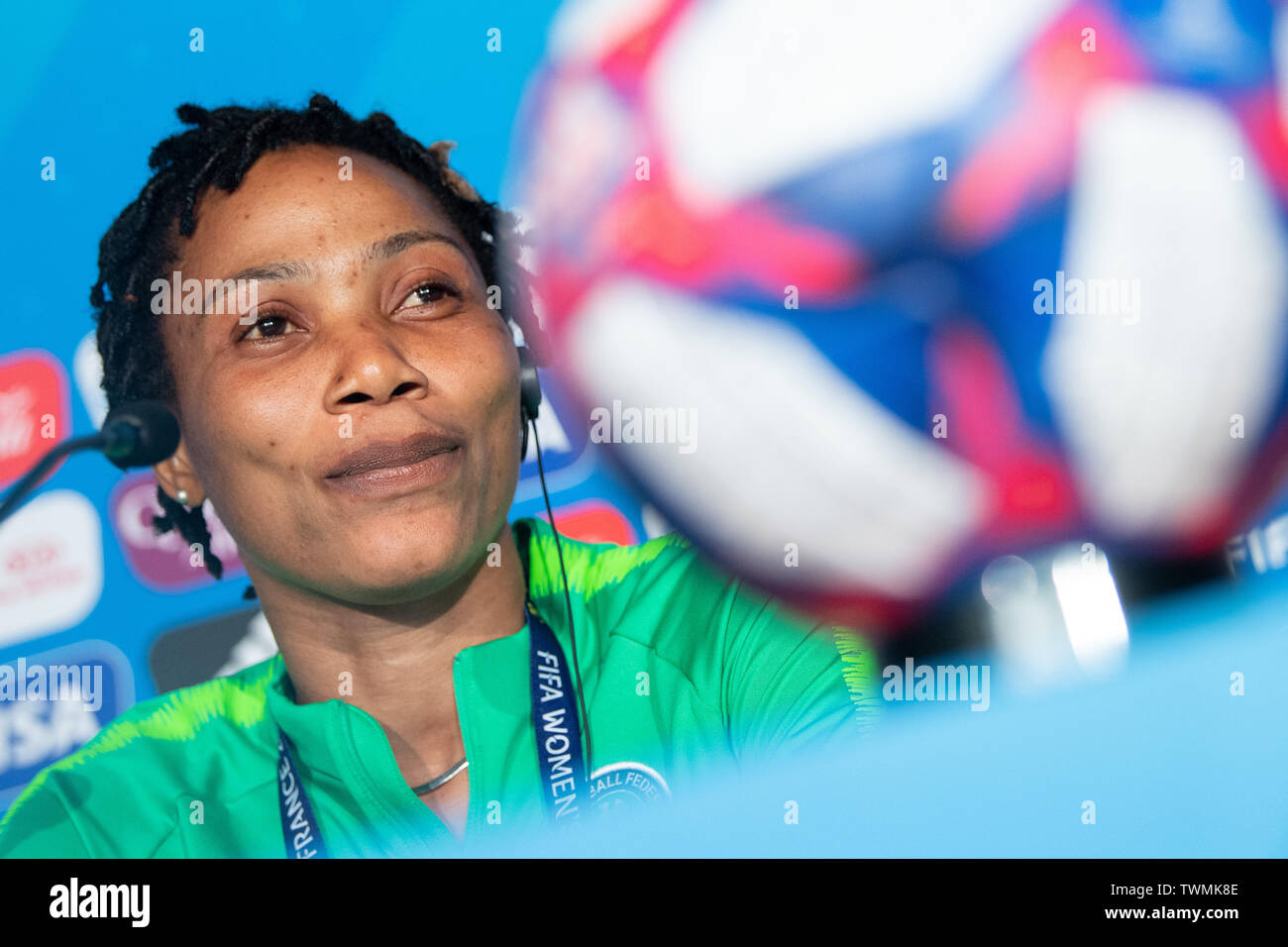 21 June 2019, France (France), Grenoble: Football, women: World Cup, national team, Nigeria, final press conference: player Onome Ebi sits on the podium at the press conference. Photo: Sebastian Gollnow/dpa Stock Photo