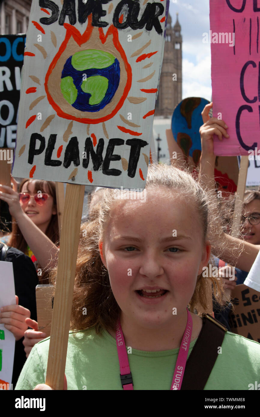 The London protest in support of Greta Thunberg's School Strike for the Climate. Children and teenagers rallied at Parliament Square and marched up Whitehall to Trafalgar Square, many carrying home-made placards. Stock Photo
