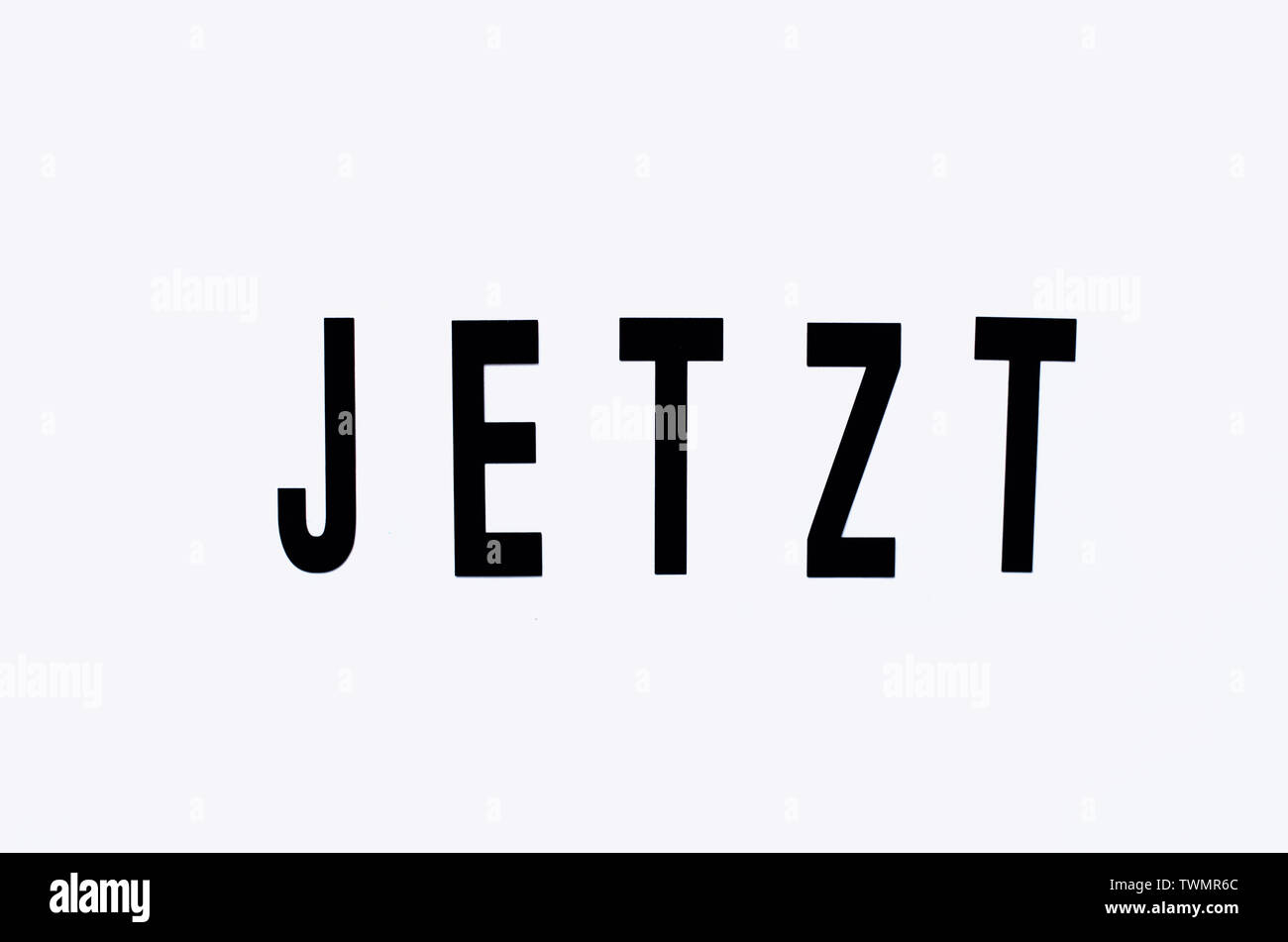 JETZT / NOW Schrift Stock Photo