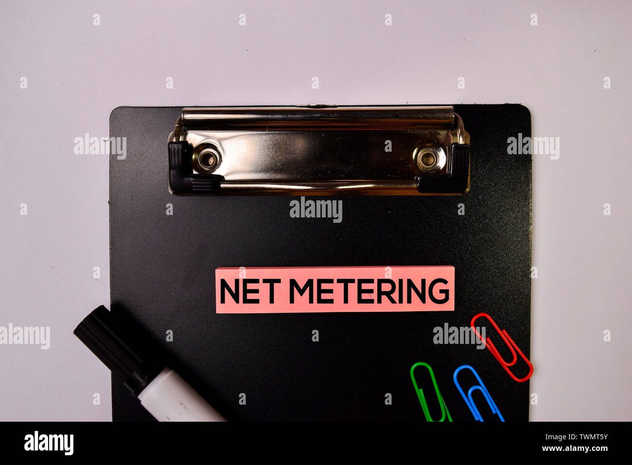 Net Metering on sticky notes isolated on white background. Stock Photo
