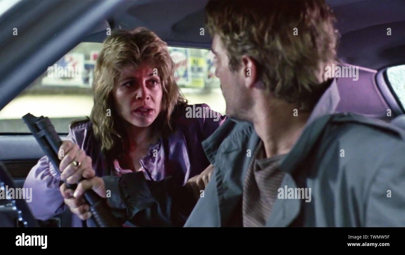 USA. Linda Hamilton and Michael Biehn in a scene from the ©Orion Pictures  movie: The Terminator (1984). Plot: A seemingly indestructible robot is  sent from 2029 to 1984 to assassinate a young, image size:1300x818