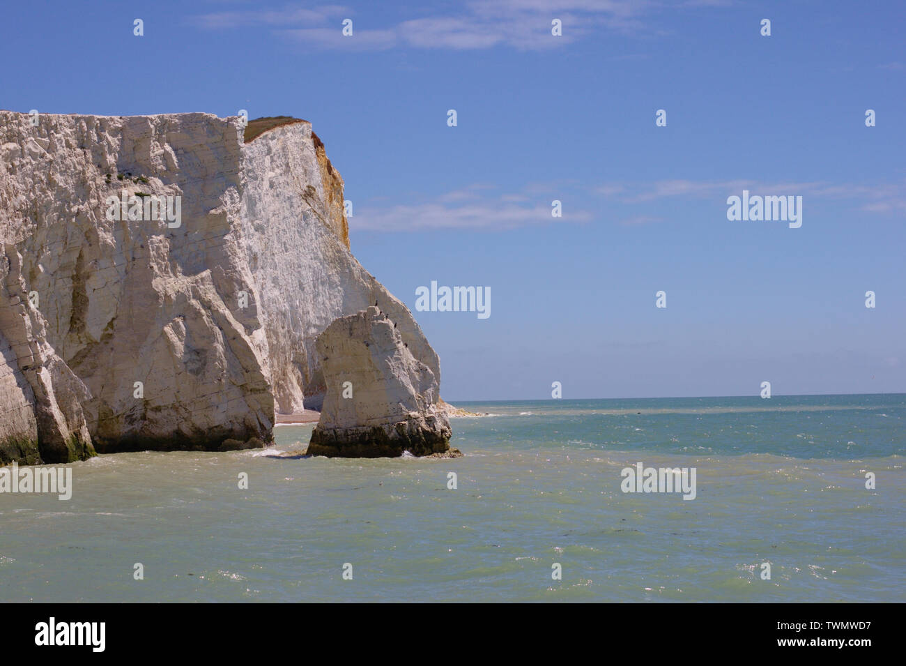 White cliffs Seven Sisters at the beach of Seaford, East Sussex, UK. Clear day. Stock Photo