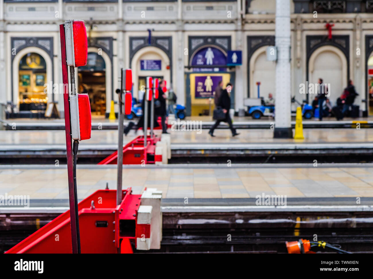 Red railway buffers in Paddington Railway Station, London, UK on 18 December 2012 Stock Photo