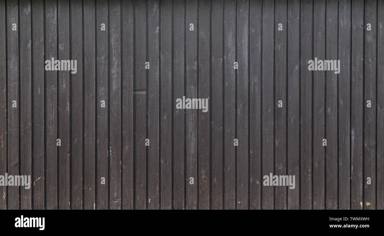 High resolution full frame background of a weathered wood board wall or paneling painted in gray. Copy space. Stock Photo