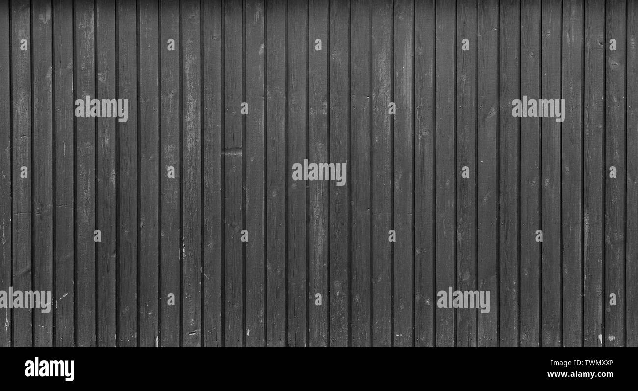 High resolution full frame background of a weathered wood board wall or paneling in black and white. Copy space. Stock Photo