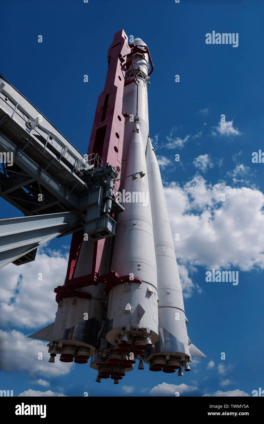 Model of rocket Vostok-1. View on background blue sky with white clouds Stock Photo