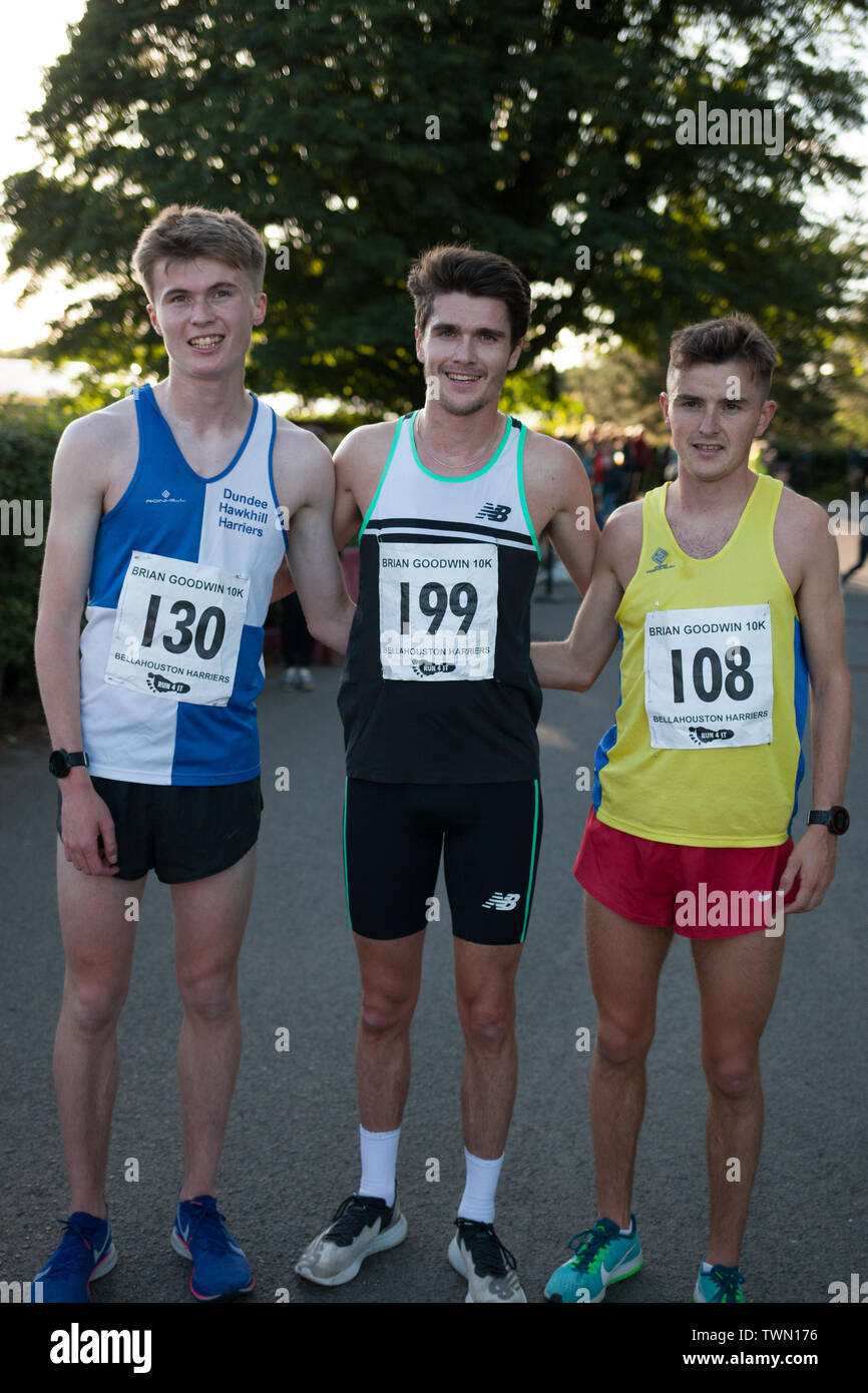 Glasgow, Scotland. 21st June, 2019. The Brian Goodwin Memorial 10km road race, hosted by Bellahouston Harriers running club, and held in Glasgow's scenic Pollok Country Park, was tonight won by Olympian Callum Hawkins in a time of 29minutes 06secs. (Hawkins wears Bib 199, Kilbarchan AAC); 2nd male was Jamie Crow (Bib 108, Central AC)) with a Personal Best time of 29min 43sec, and 3rd male was James Donald (30:11, Bib 130, Dundee Hawkhill Harriers).  Credit: jeremy sutton-hibbert/Alamy Live News Stock Photo