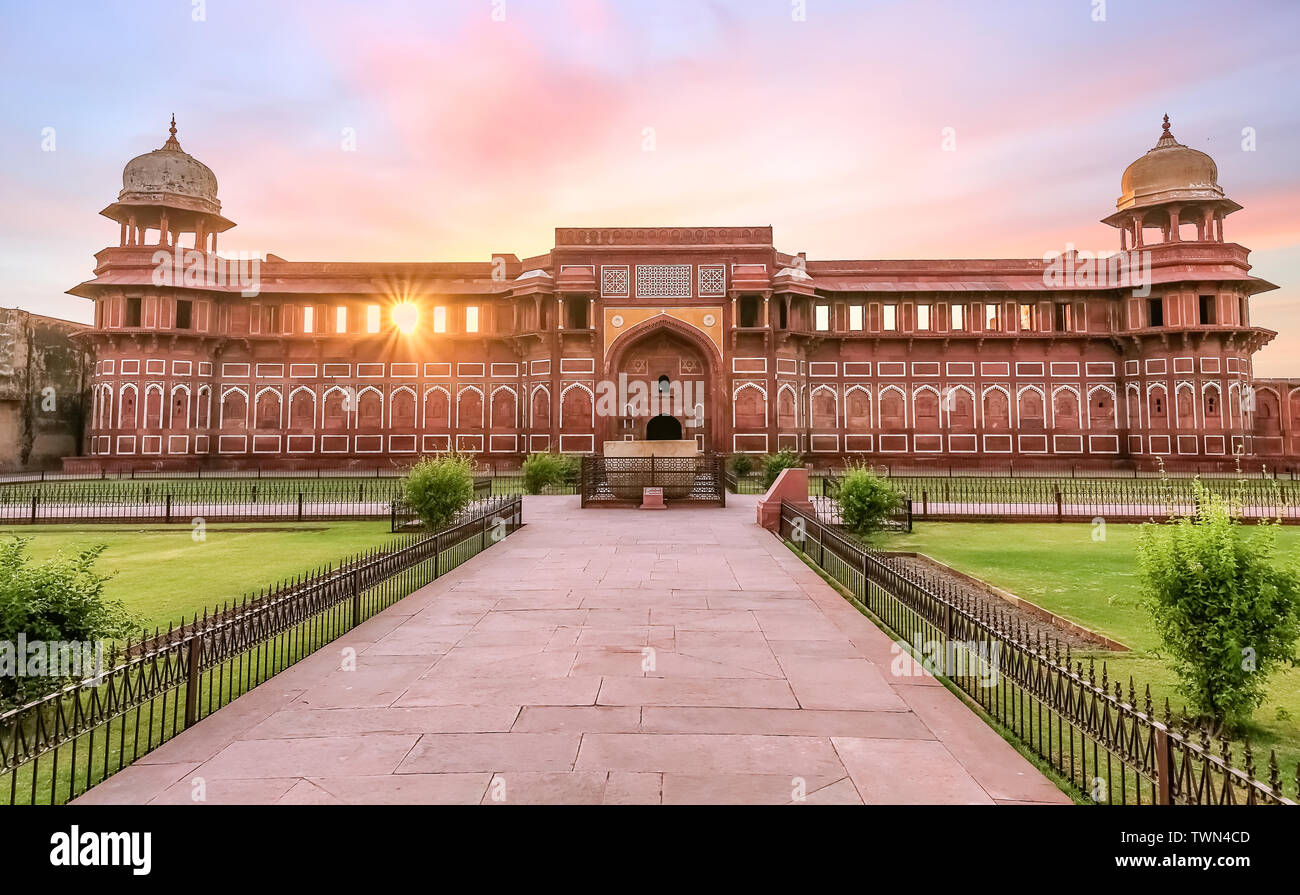 Medieval palace made of red sandstone and marble known as Jahangir Mahal inside Agra Fort at sunrise. Agra Fort is a UNESCO World Heritage site. Stock Photo