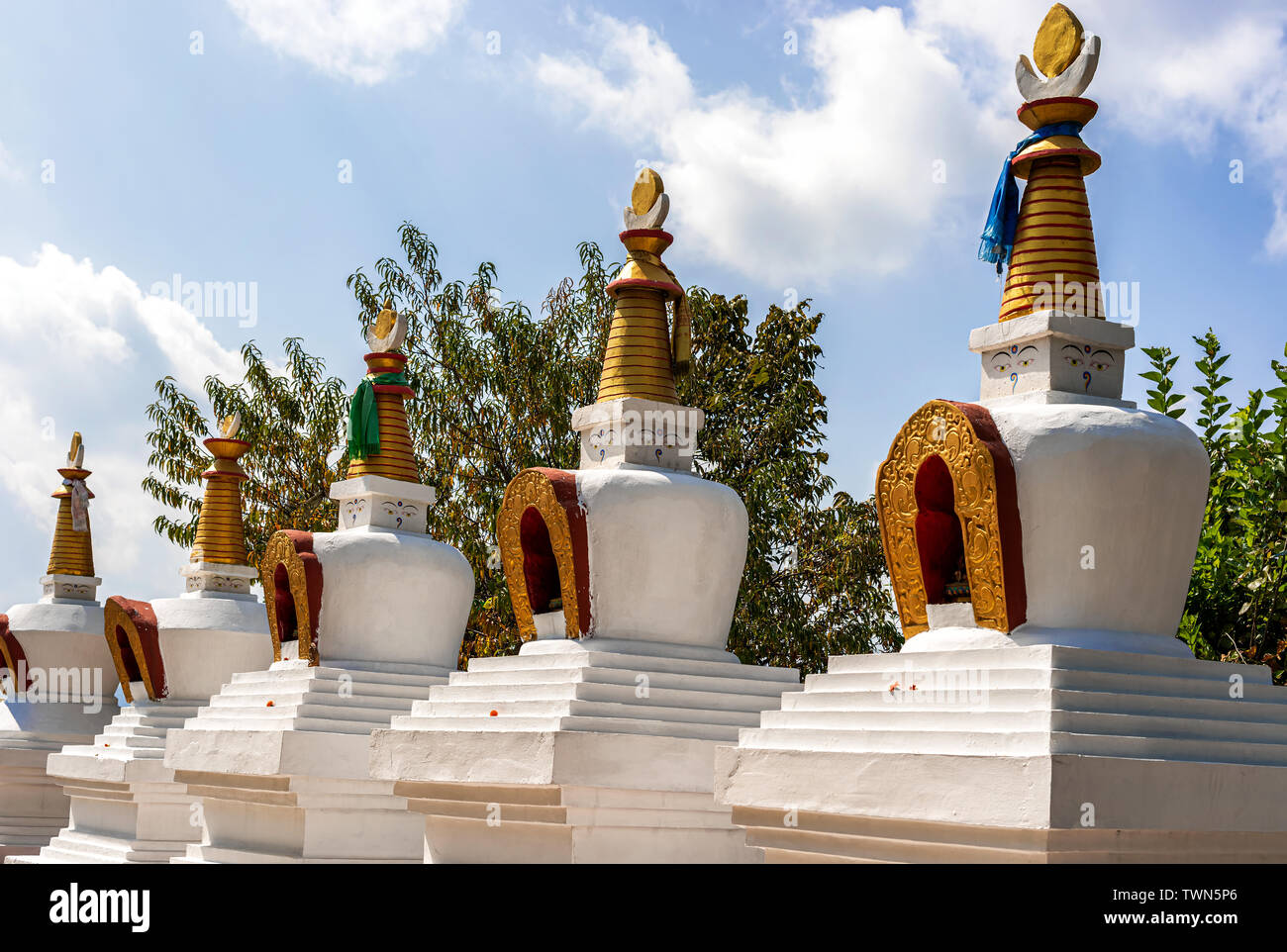 View at the stupas at Thrangu Tashi Yangtse Monastery complex called Namo Buddha monastery in Nepal. Build at the place where the prince gave his body Stock Photo