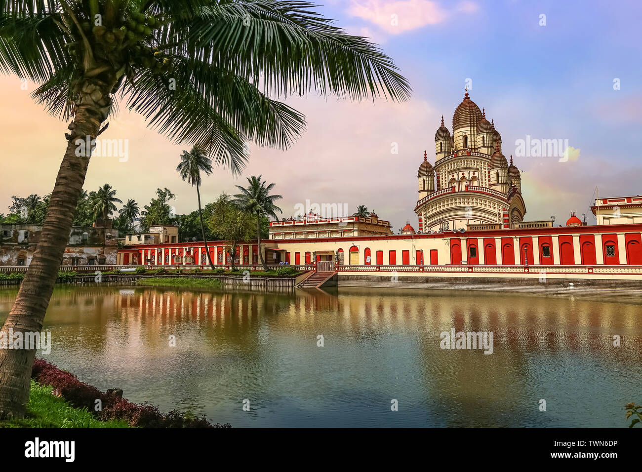 Historic Hindu temple of Goddess Kali at Kolkata Dakshineshwar with scenic landscape at sunset Stock Photo