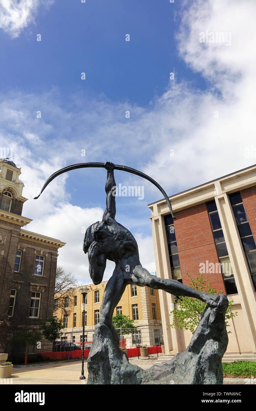 'Saltine Warrior', a bronze sculpture by Luise Kaish. It is located at the edge of the quad and is part of the art on campus iniative Stock Photo