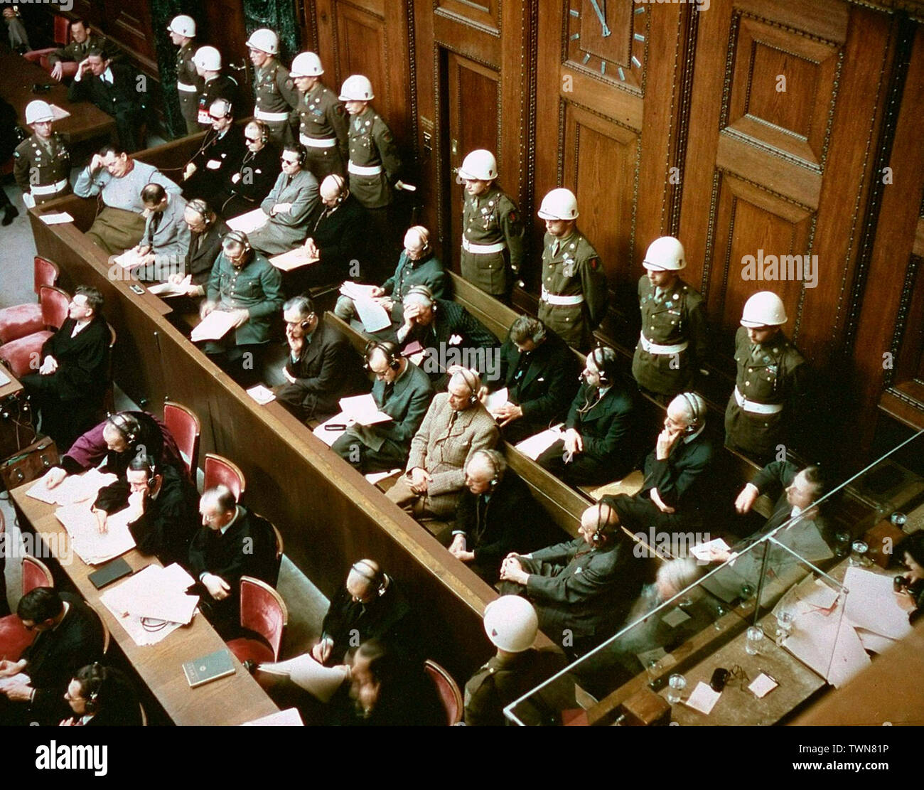 View of the defendants in the dock at the International Military Tribunal trial of war criminals in Nuremberg, Bavaria, Germany. November 1945 Stock Photo