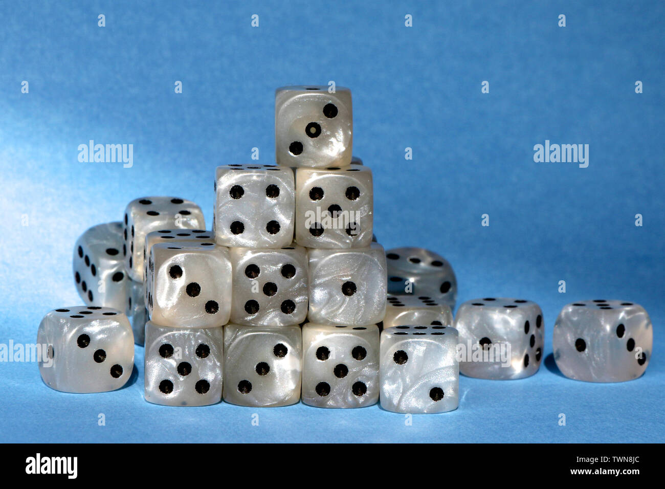 Stack of dice used for gambling. Stock Photo