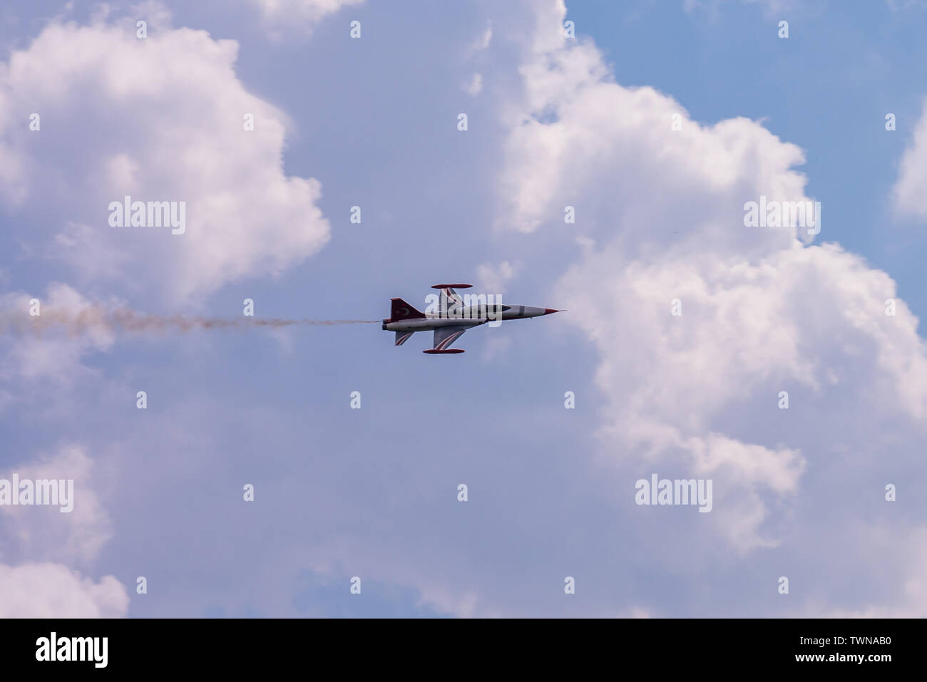 It seems this plane has won the race with the others. It shows up in the good sense of the word. The pilot is a skilled one, who manages it with talen Stock Photo