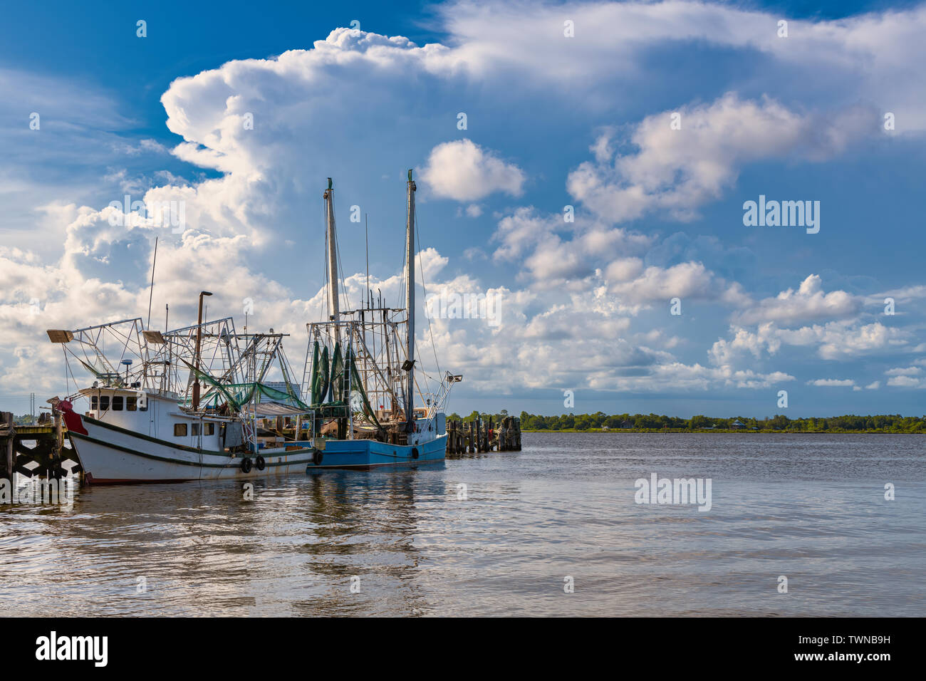 Docked shrimp boats in Biloxi Bay, Mississippi Stock Photo